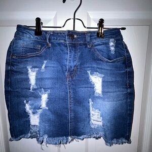 Wax Jeans Distressed mini skirt